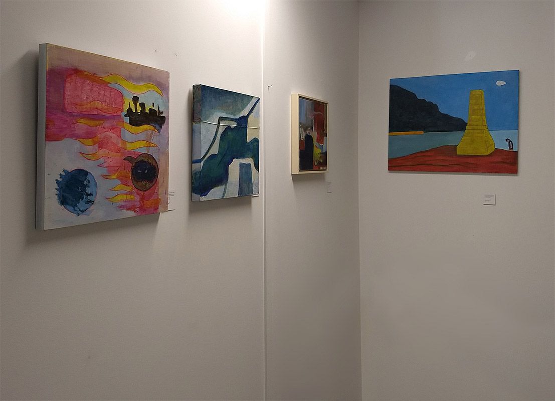 four paintings on the outside wall of my studio